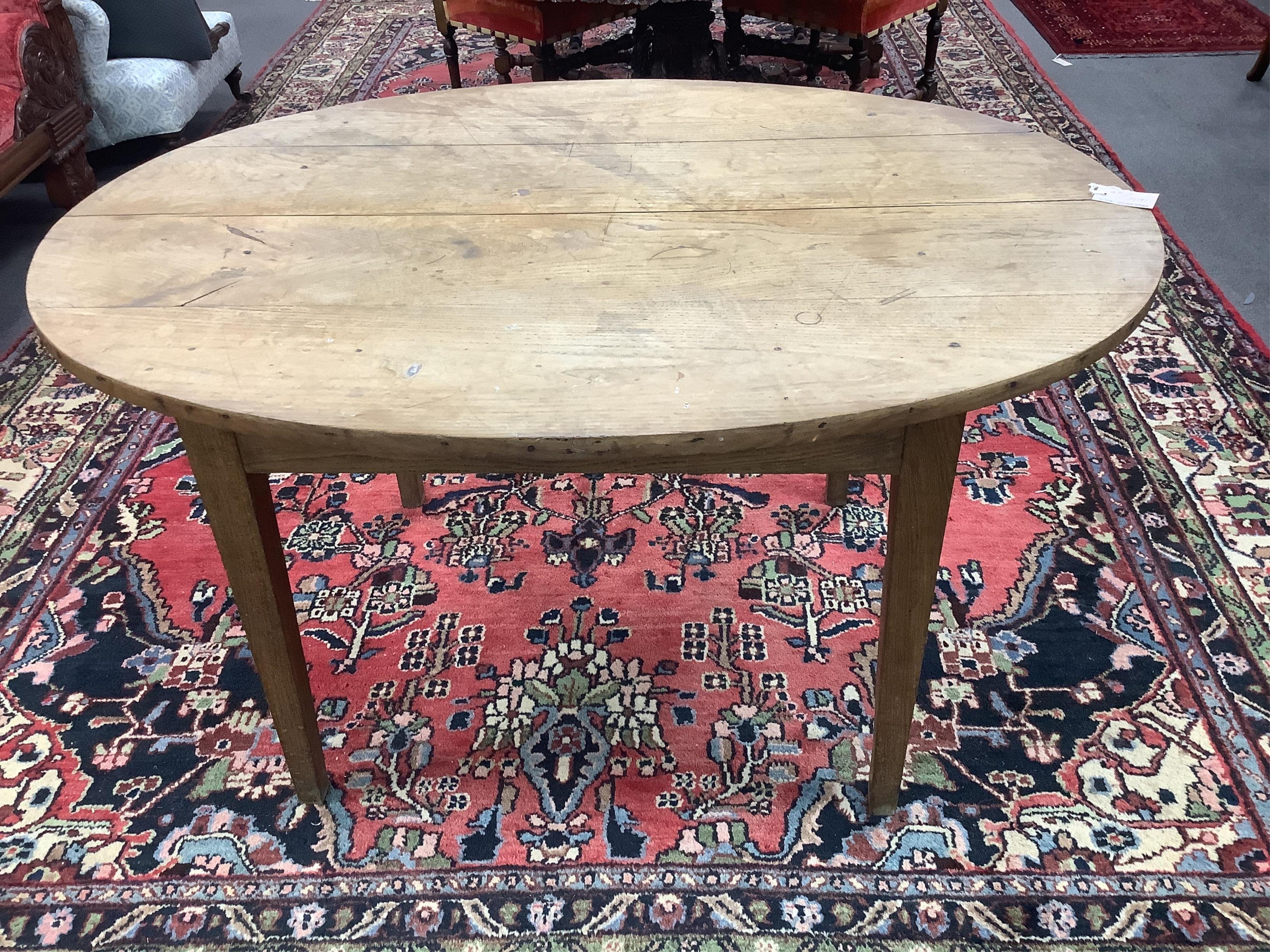 A French ash farmhouse table, width 134cm, depth 98cm, height 72cm. Condition - fair